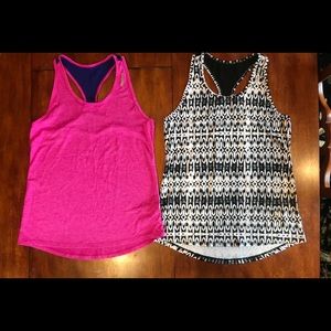 Both reebok tanks like new